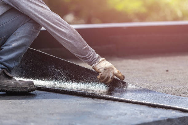 Professional Basement Waterproofing technician working in Richland, GA